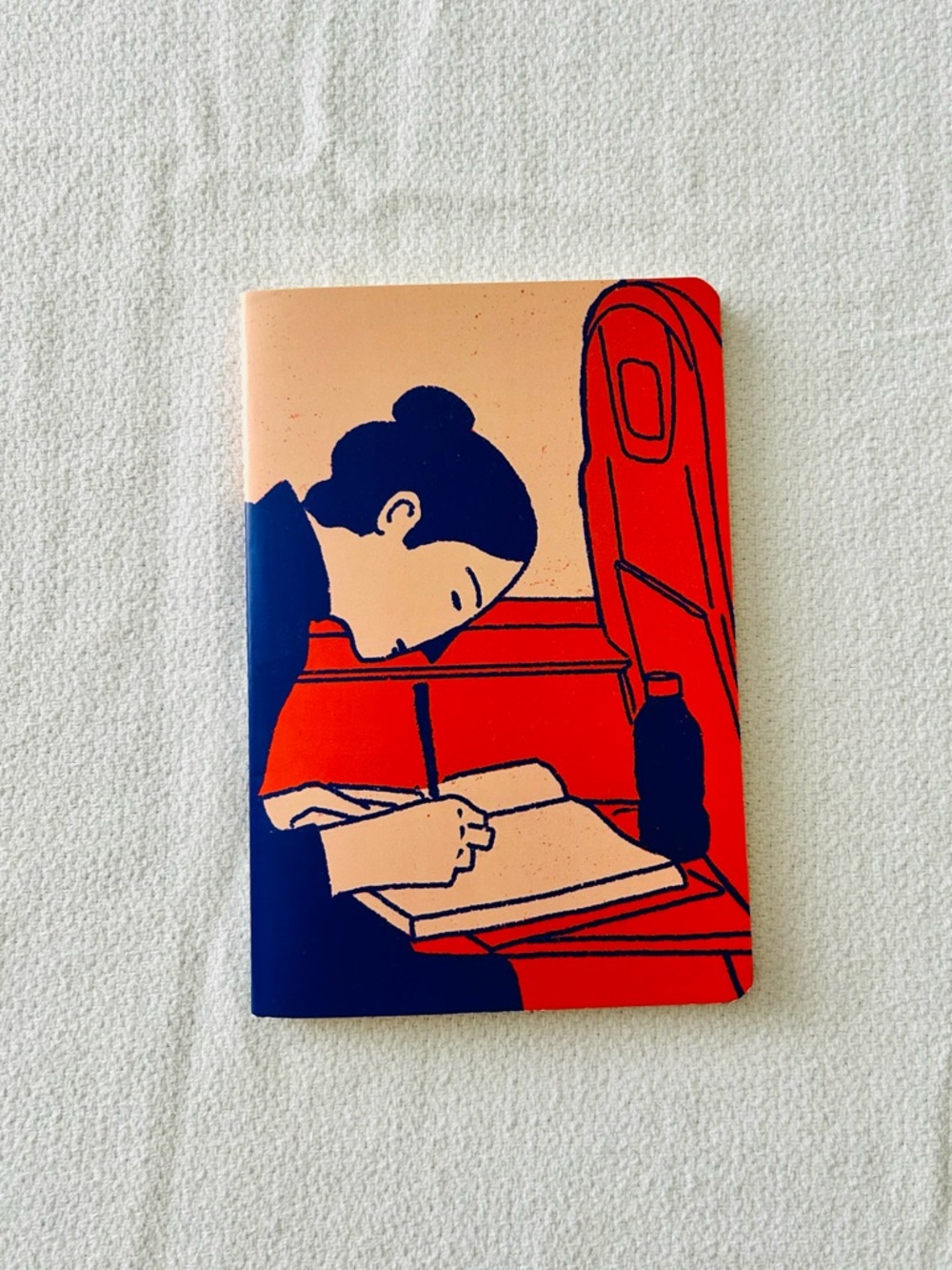 Colorful notebook featuring art created by Cristina Delgado
